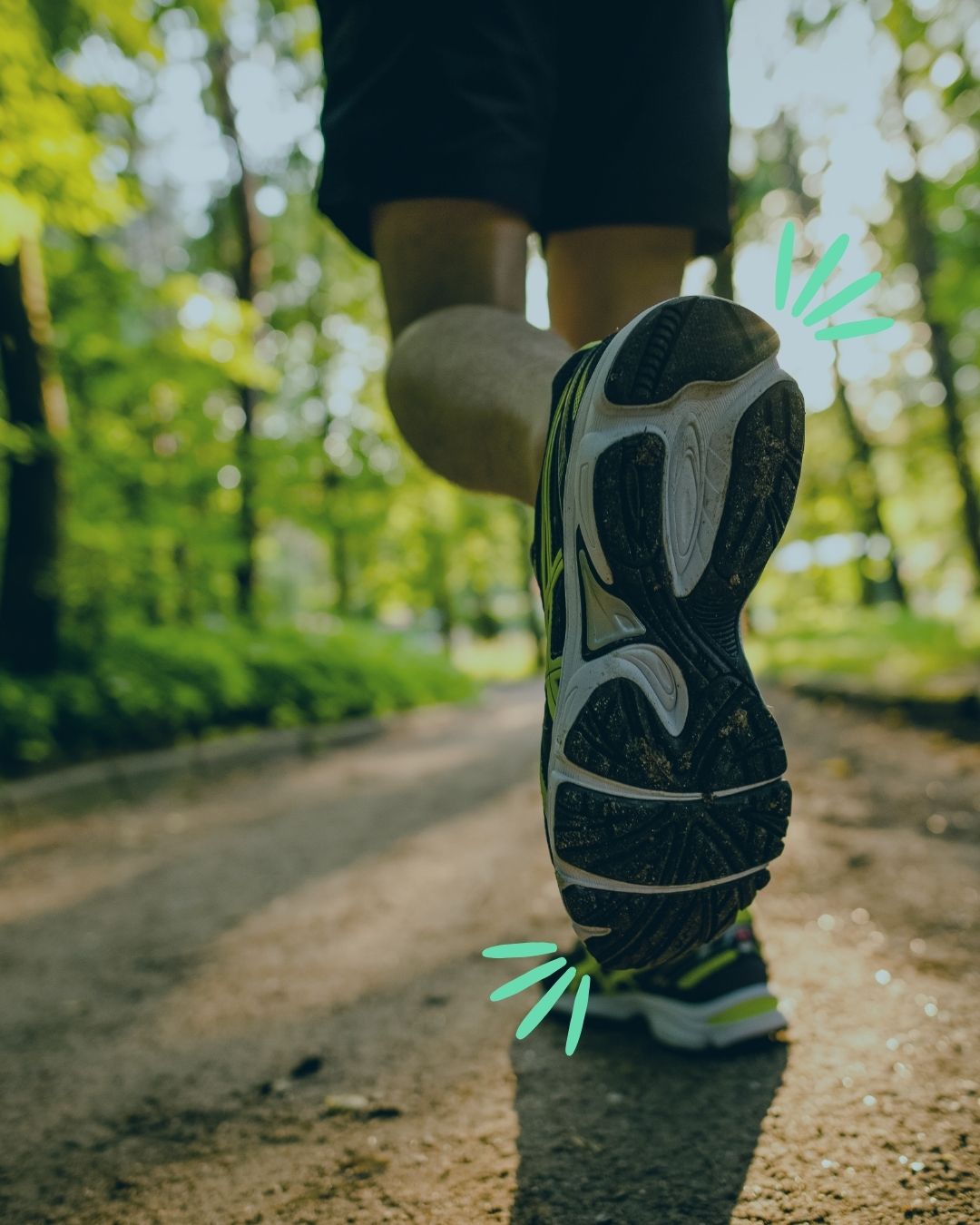close up of runner legs mid-stride with bright sparks jumping out of the foot showing energy and forward momentum