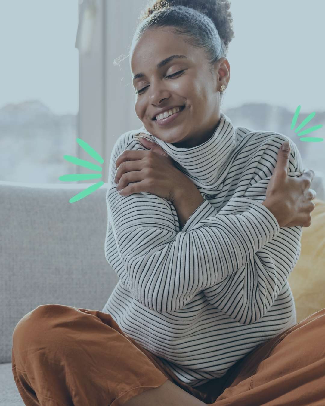 Smiling woman hugging self looks peaceful and happy to have access to patient resources